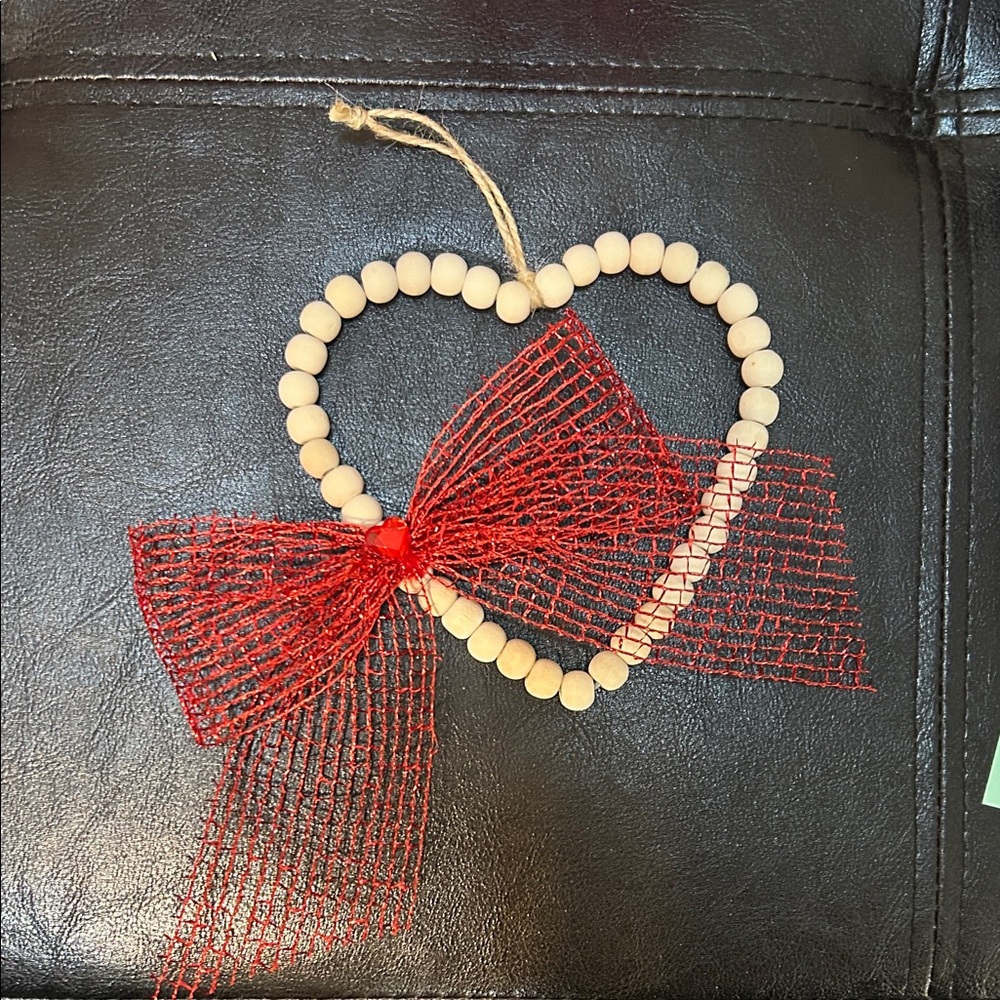 Handmade Heart-Shaped Beaded Ornament with Red Bow